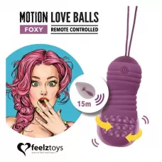 Фиолетовые вагинальные шарики с вращением бусин Remote Controlled Motion Love Balls Foxy фиолетовый 