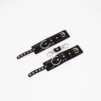 Черные кожаные наручники с золотистой фурнитурой черный с золотистым 