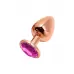 Золотистая анальная втулка Wooomy Tralalo M с розовым кристаллом - 8 см розовый 