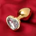 Золотистая анальная пробка с прозрачным кристаллом в форме сердца золотистый 
